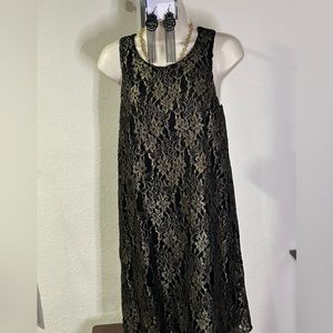 ASTR Black and Gold classy dress for holiday season or date night.